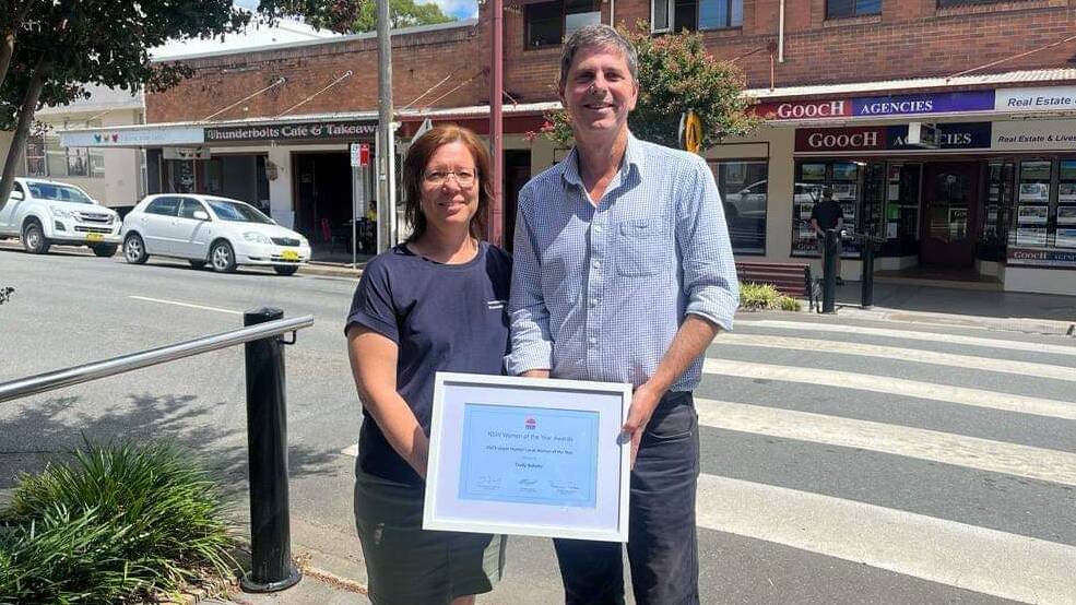 Trudy Schultz receiving her certificate of inclusion in the 'Hidden Treasures Honour Roll' from the member for Upper Hunter, Dave Layzell MP. Picture supplied.