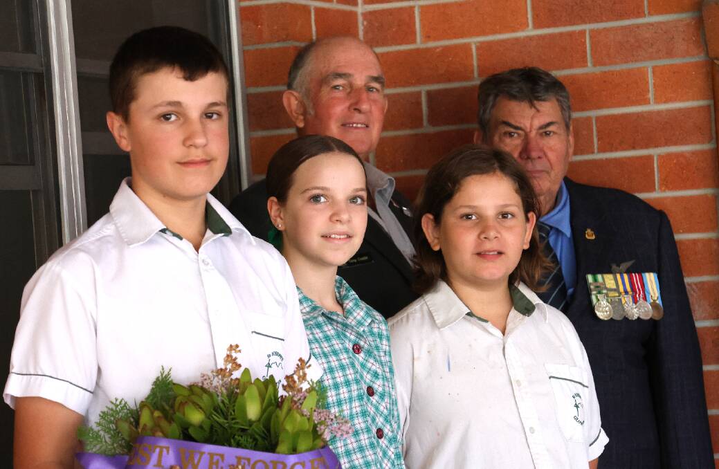 St Joseph's Primary students Toby Croker, Molly Paynter and Rory Ashby with Gloucester RSL Sub-branch members Greg Godde and John Salter. Picture by Rick Kernick.