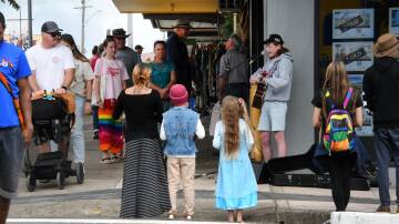 Wingham's annual Busker Muster brings the town's main streets alive with music, colourful characters, and crowds of people. Picture by Scott Calvin